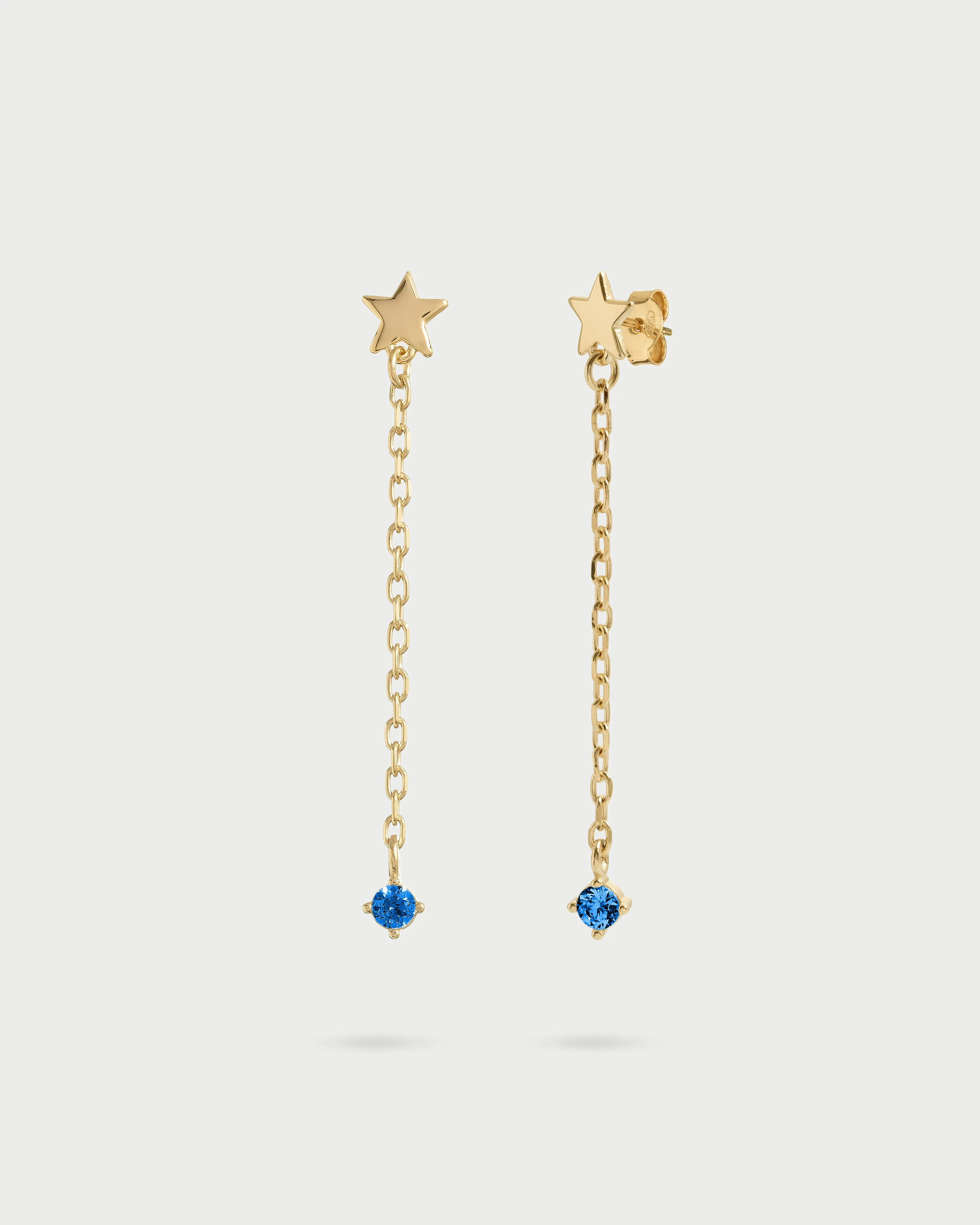 Orecchini stella catenella line e punto luce